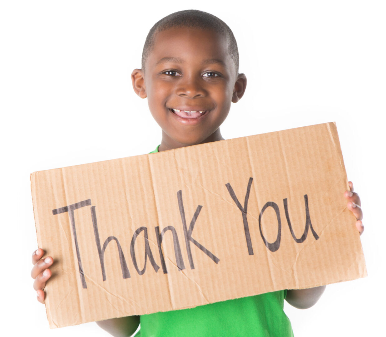 Child holding a "Thank You" sign.